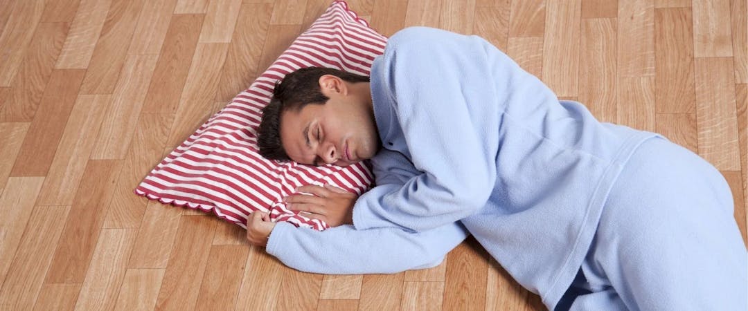 Is Sleeping on the Floor Healthy? Benefits, Side Effects, and More