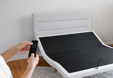 Nolah Adjustable Base with Headboard remote in use